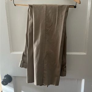 Very nice Tommy Hilfiger khakis. Never worn. They shrunk in my closet.